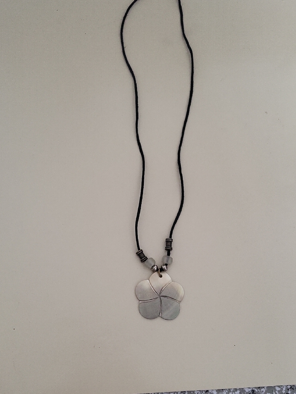 Hand Crafted Silver Four-Leaf Clover Necklace on Black Cord